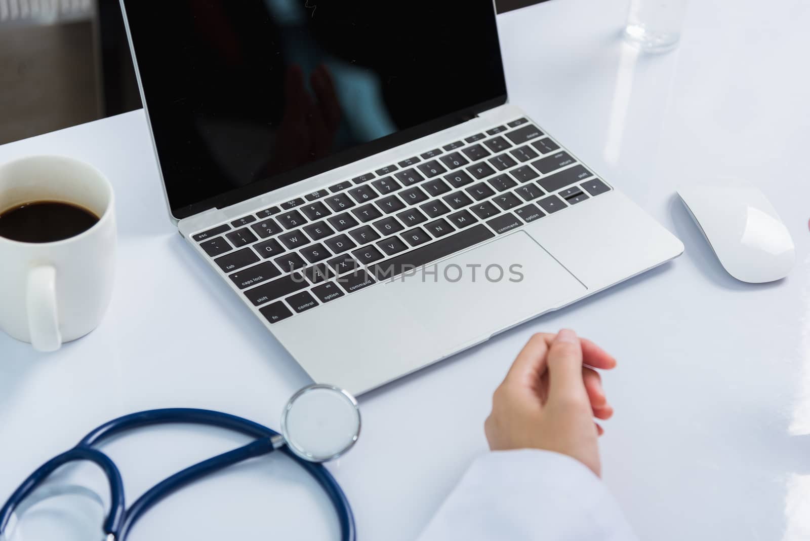 Medicine doctor's working on desk. Closeup of Stethoscope by Sorapop