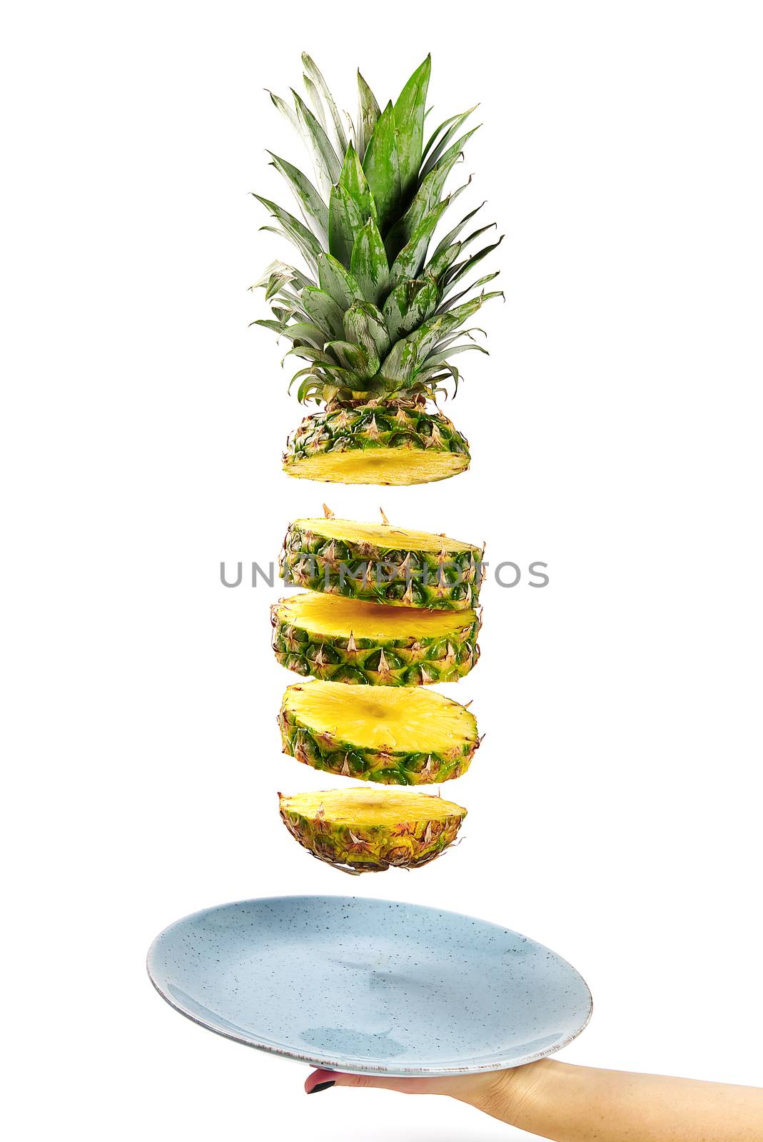 Pineapple fresh ananas. Pineapple sliced, levitates in the air. Tropical fruit. Concept of summer mood on white background, isolate.
