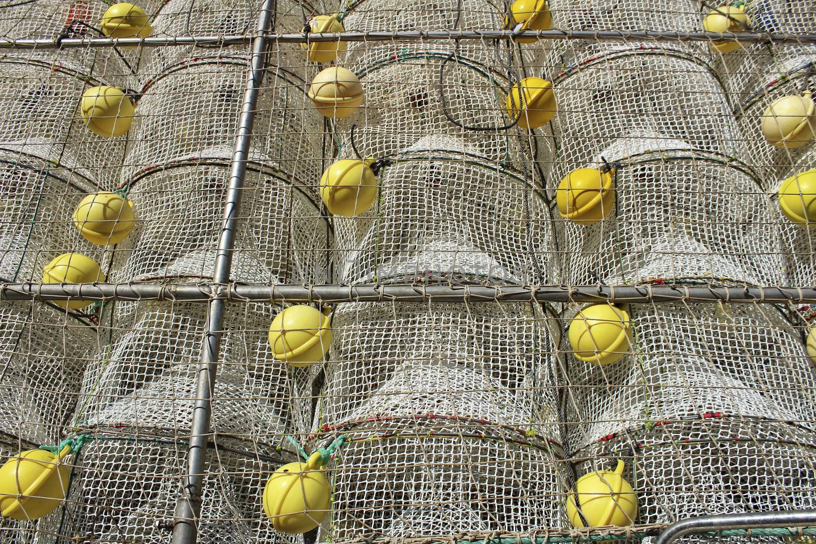 Cages to catch seafood stacked in the port of Santa Pola, Alicante Spain