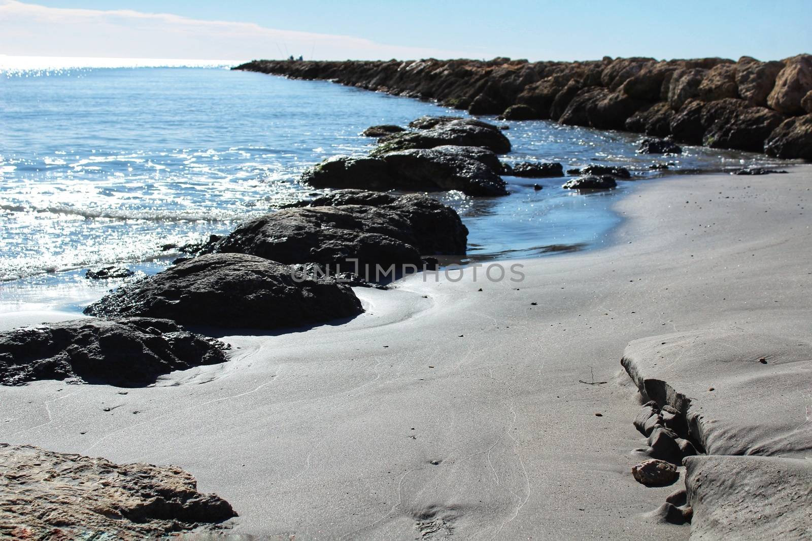 Sunny day on the beach in winter in Santa Pola, Alicante