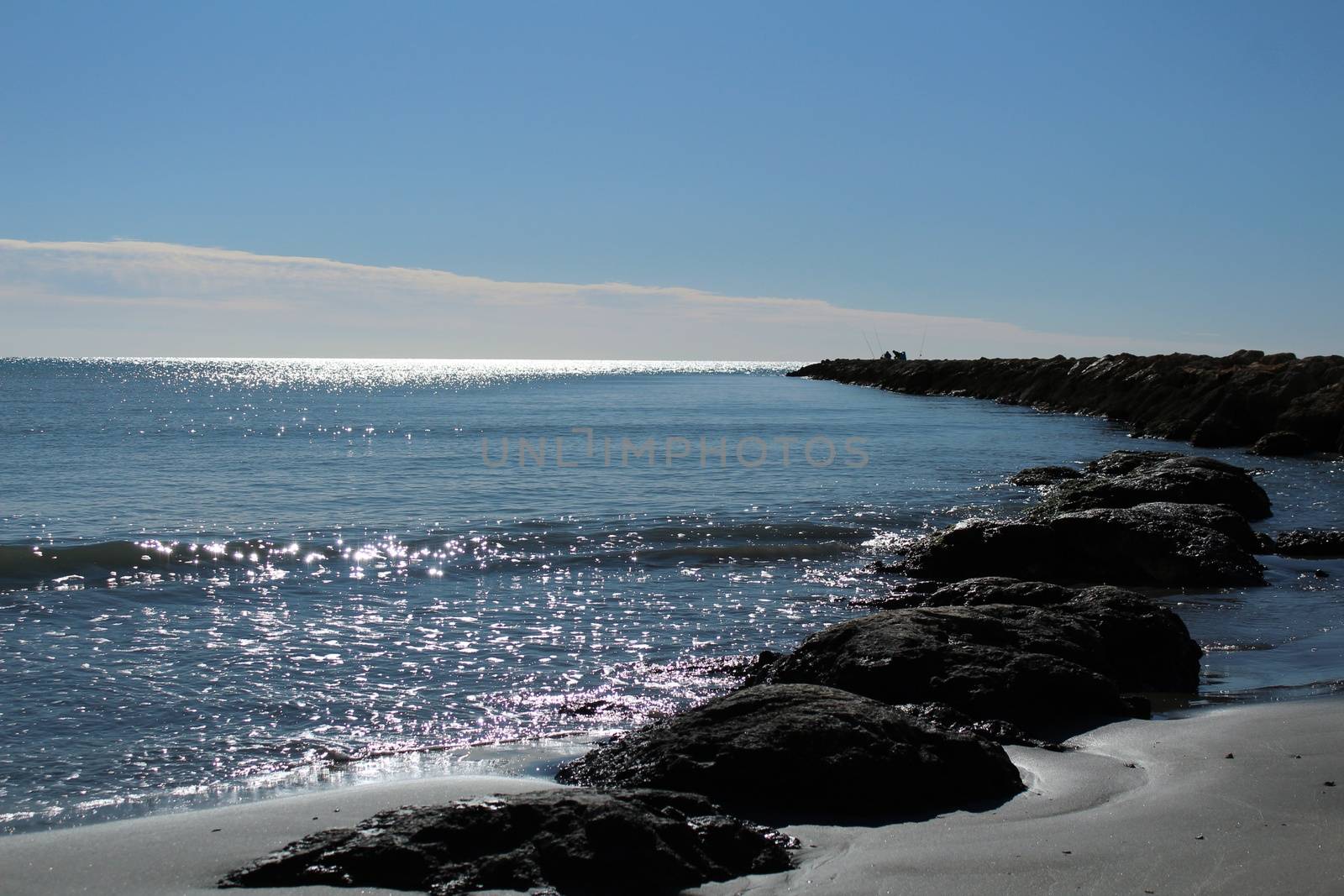 Sunny day on the beach in winter in Santa Pola, Alicante