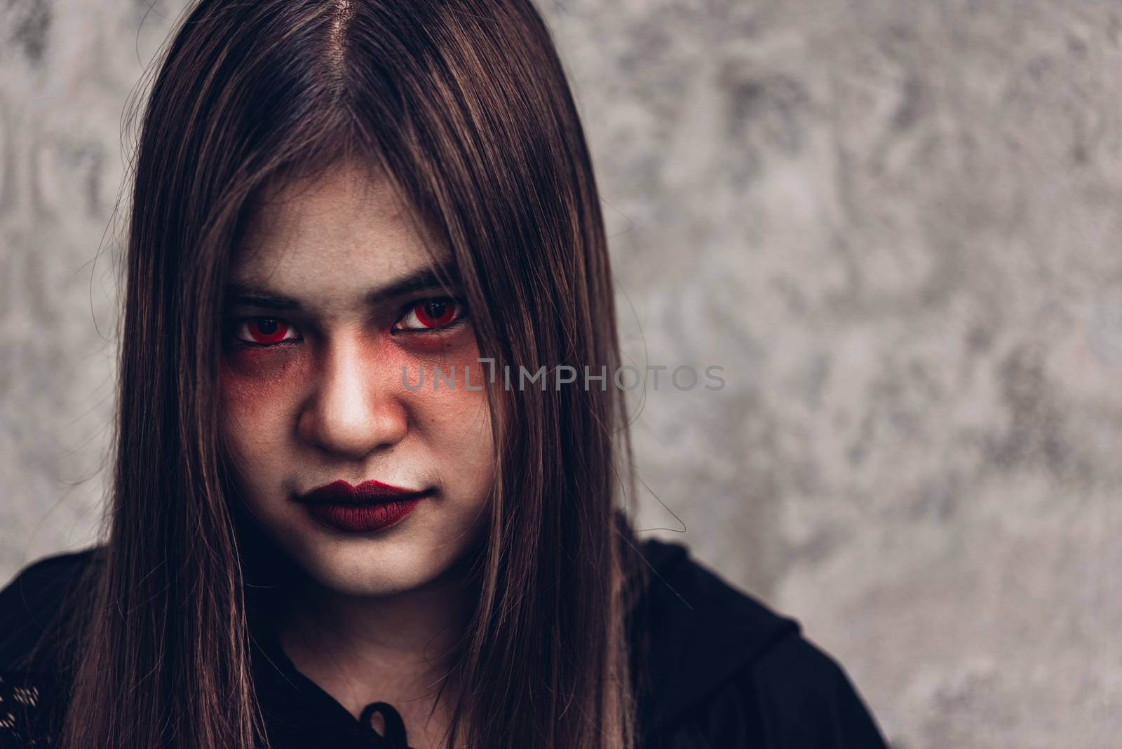 Face of portrait woman ghost have red eye halloween concept