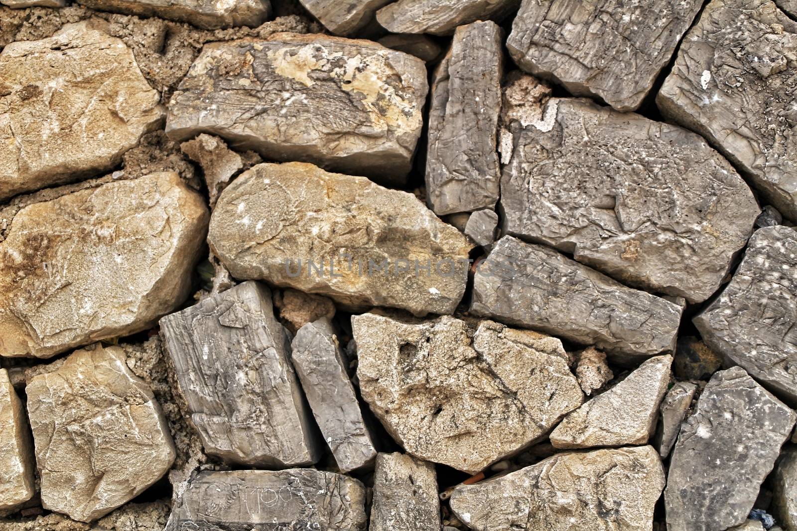Texture and background of grey stone on wall