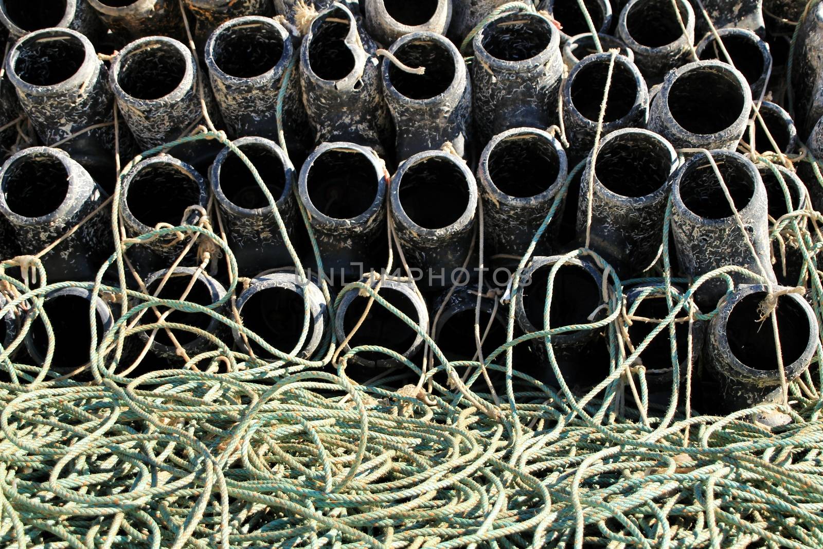 Traps to fish octopus and nets in the pier of Santa Pola, Spain