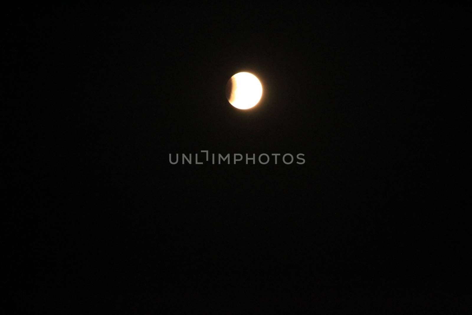 Full moon with partial eclipse in Spain