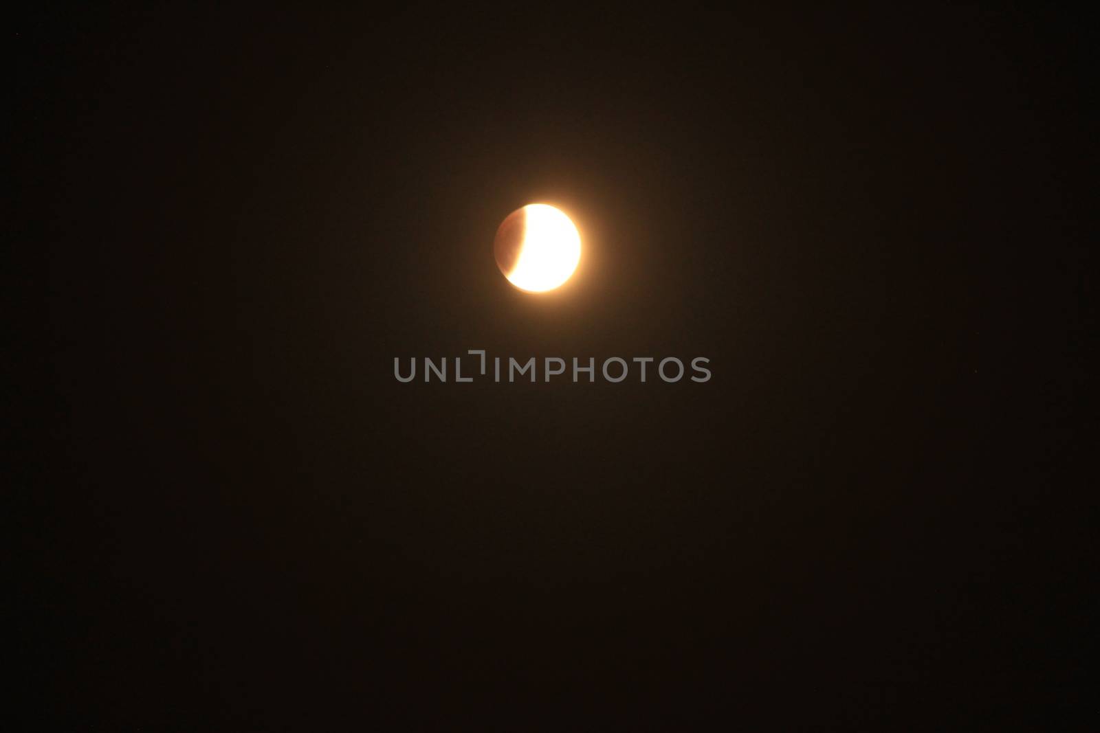 Full moon with partial eclipse in Spain