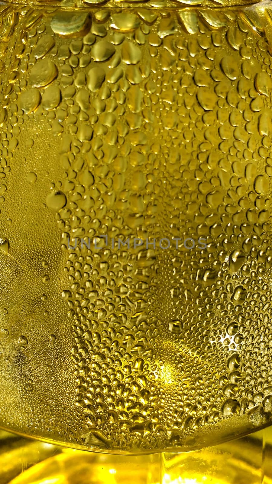 Colorful texture of evaporated water in a yellow vaporizer