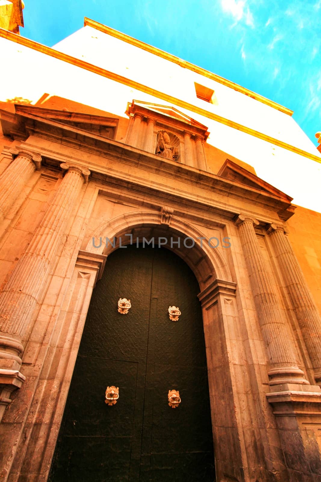 Beautiful facade of the Co-cathedral of Saint Nicholas of Bari in Alicante, Spain