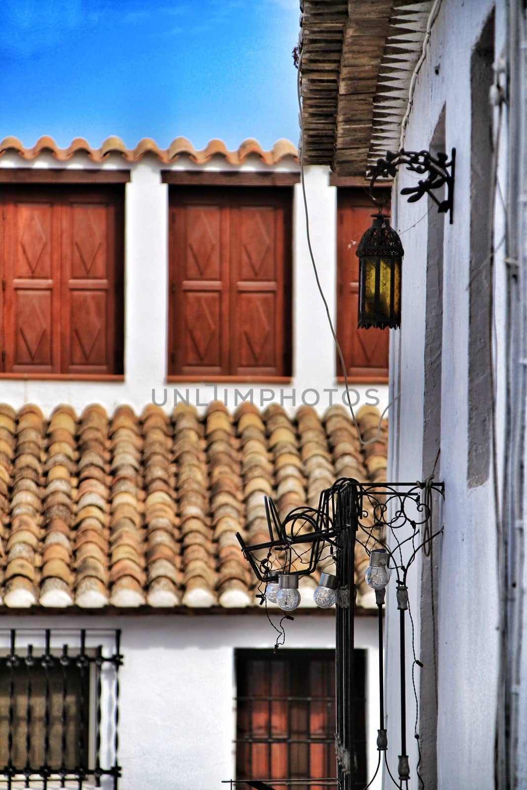 Narrow streets and white facades in Altea by soniabonet