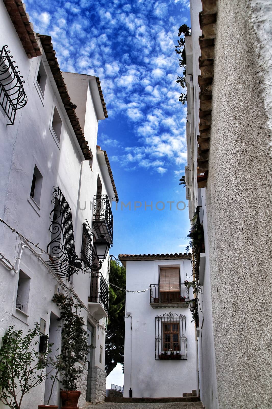 Narrow streets and beautiful white facades in Altea, Alicante, Spain