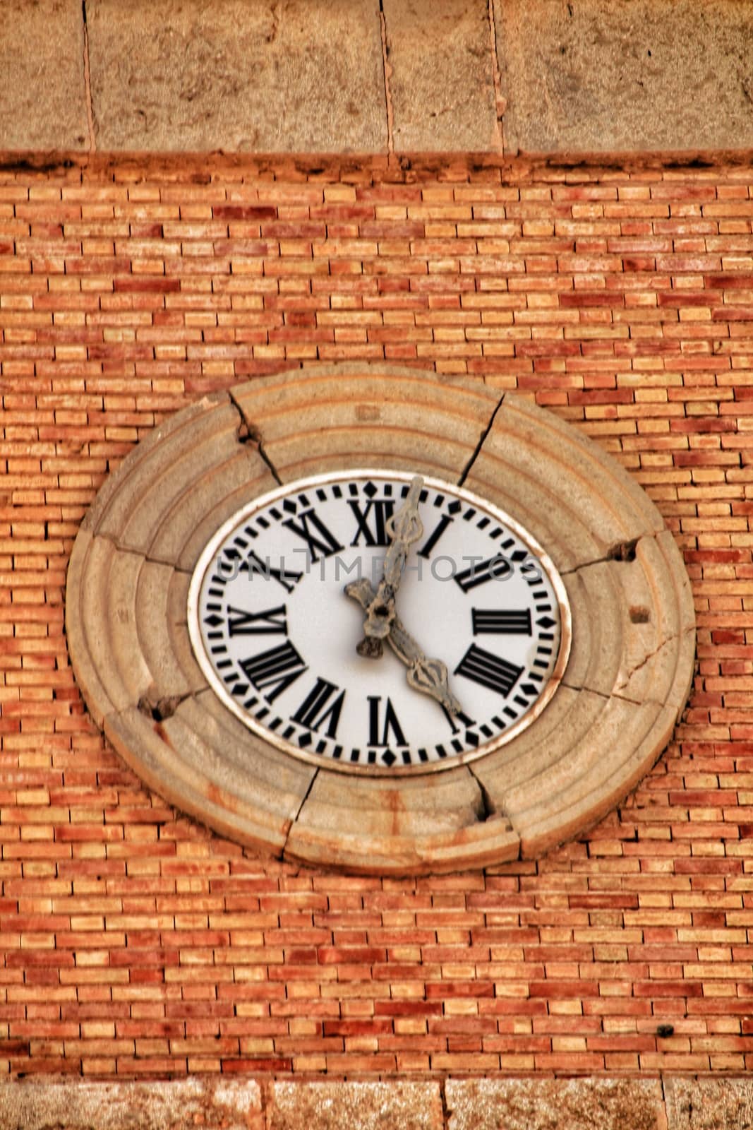 Antique clock in church tower in Altea square, Alicante, Spain