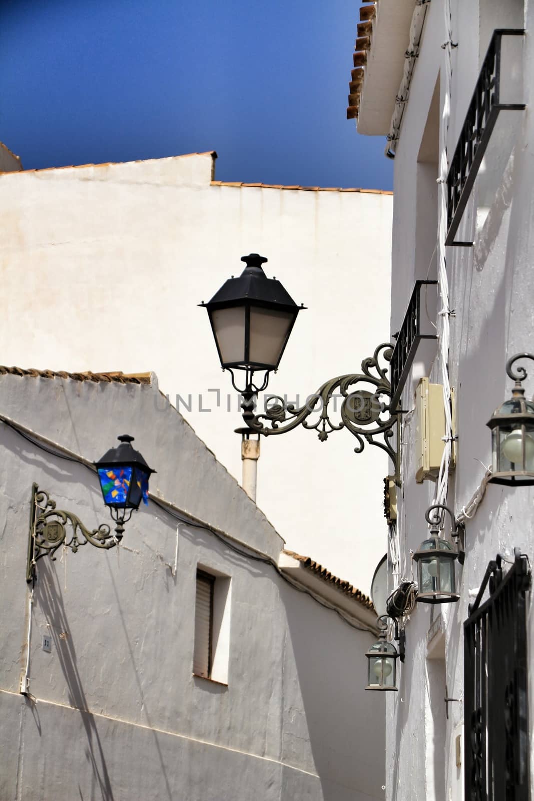 Narrow streets and beautiful white facades in Altea, Alicante, Spain