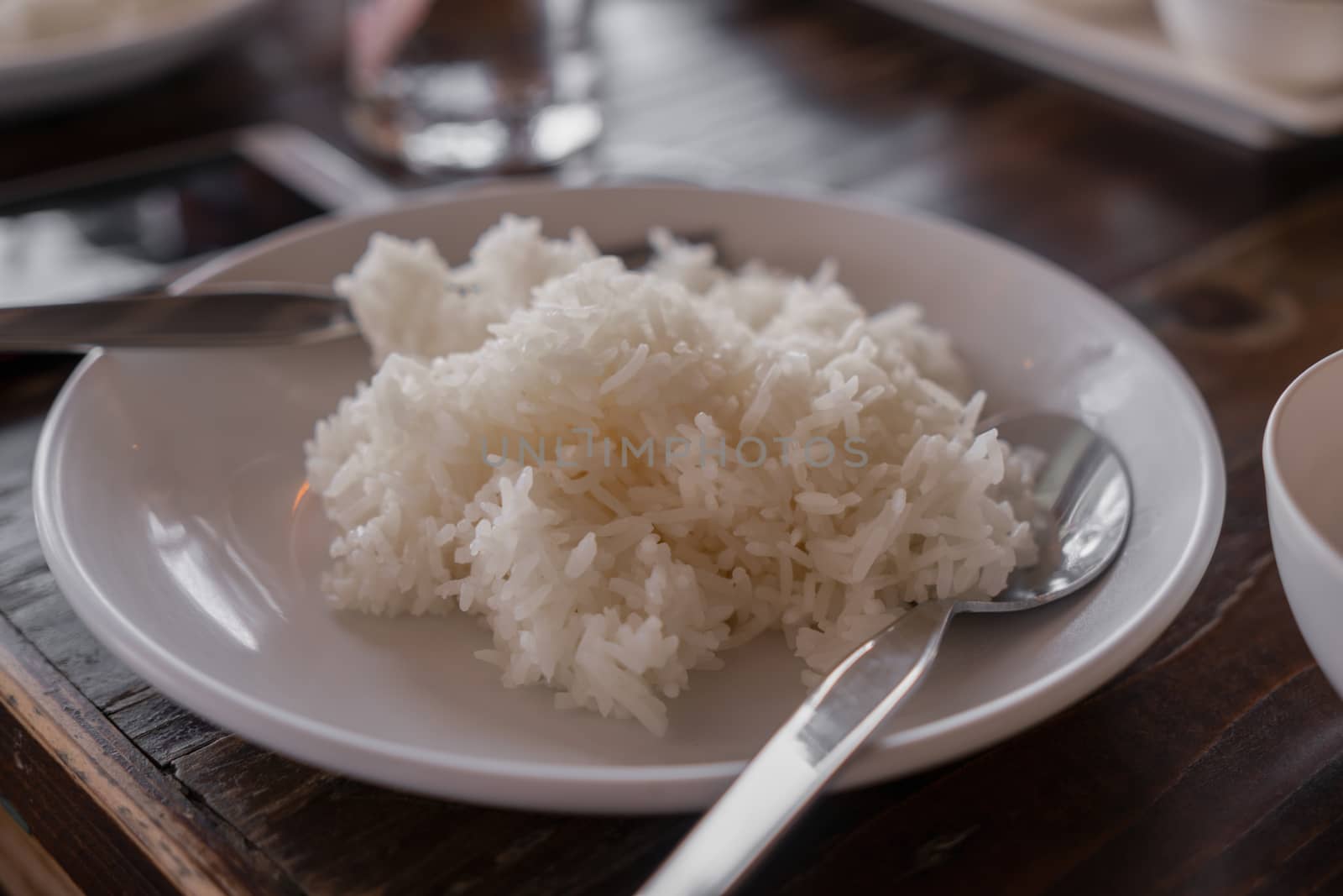 Rice in plates and utensils, ready to eat