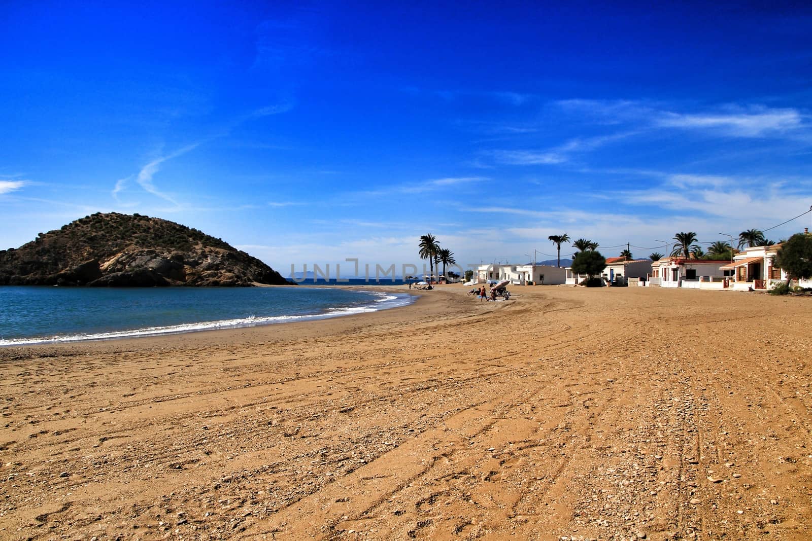 Beautiful Bahia beach in Mazarron, Murcia, Spain. Island in the background.
