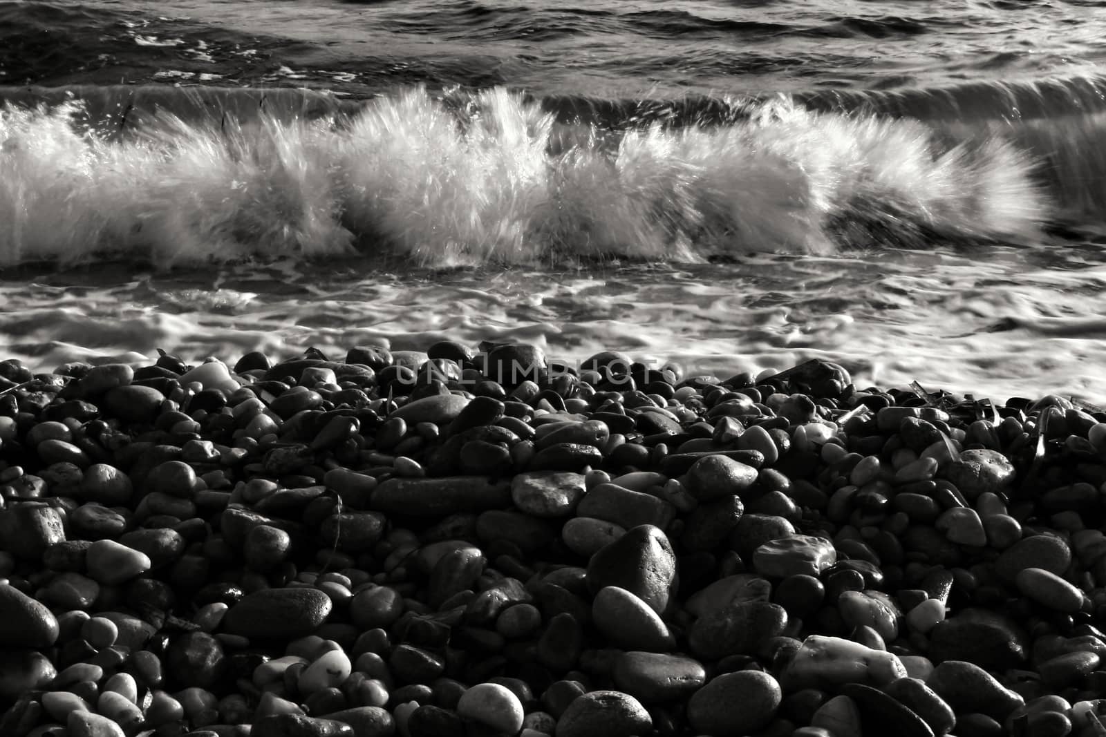 Rock textures and waves on the shore in Cartagena, Murcia, Spain
