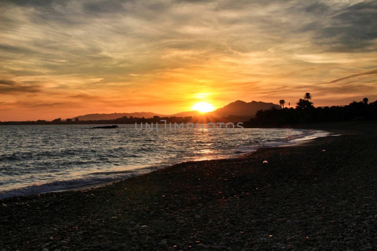 Beautiful Sunset on Mojon beach in Isla Plana, Cartagena, Murcia,Spain.