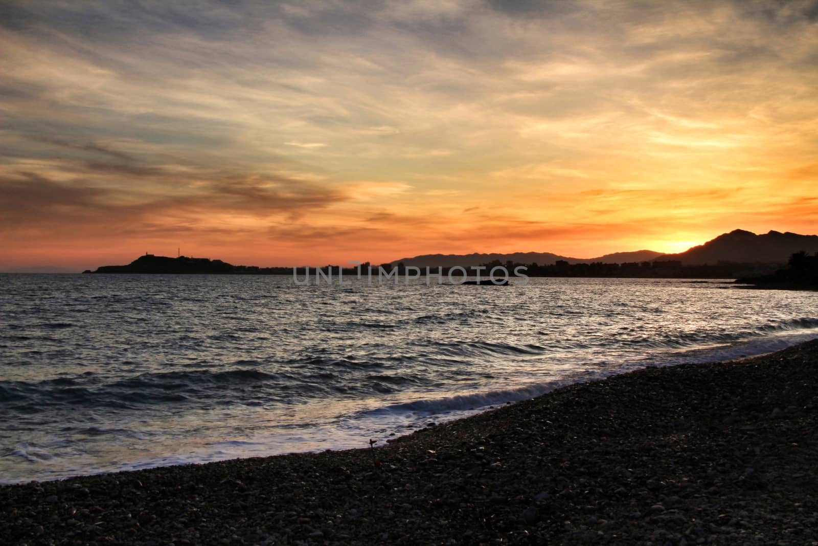 Beautiful Sunset on Mojon beach in Isla Plana, Cartagena, Murcia,Spain.