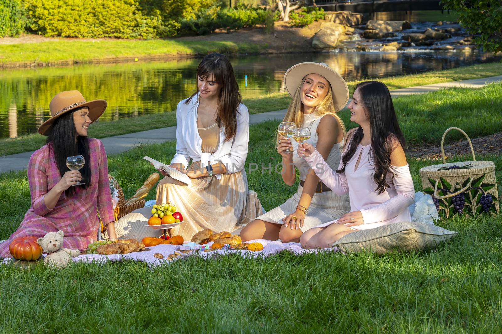 A Group Of Friends Enjoy Each Others Company On A Fall Day Outdoors by actionsports