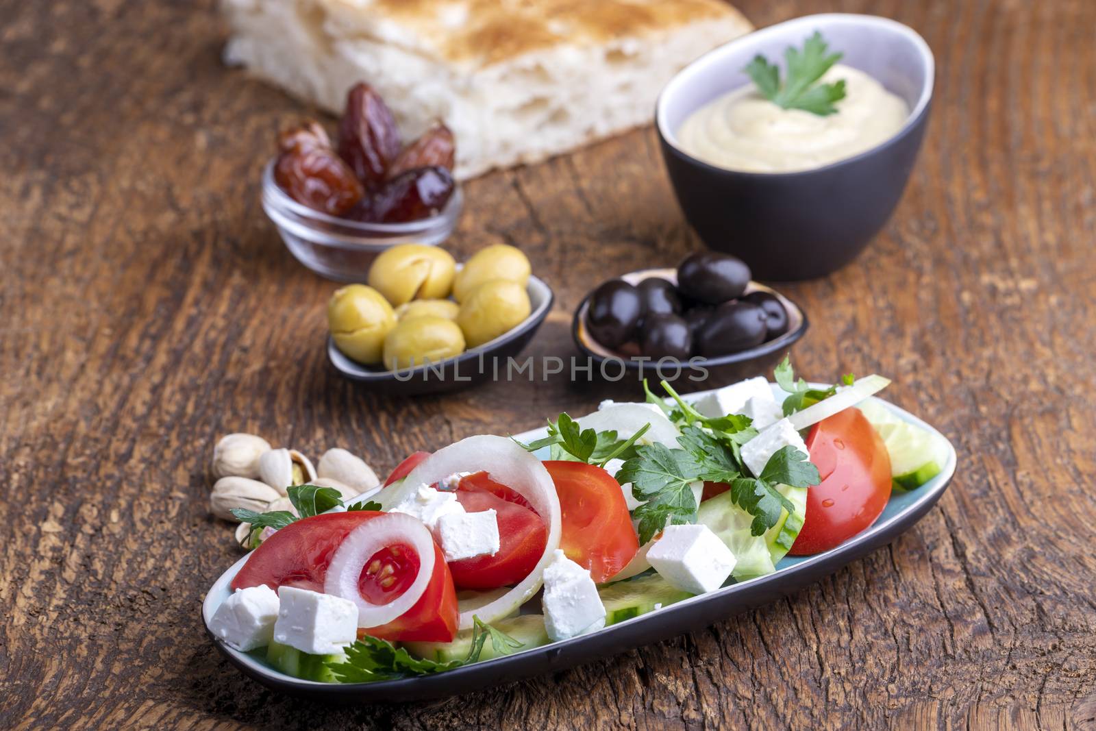 olives and hummus by bernjuer