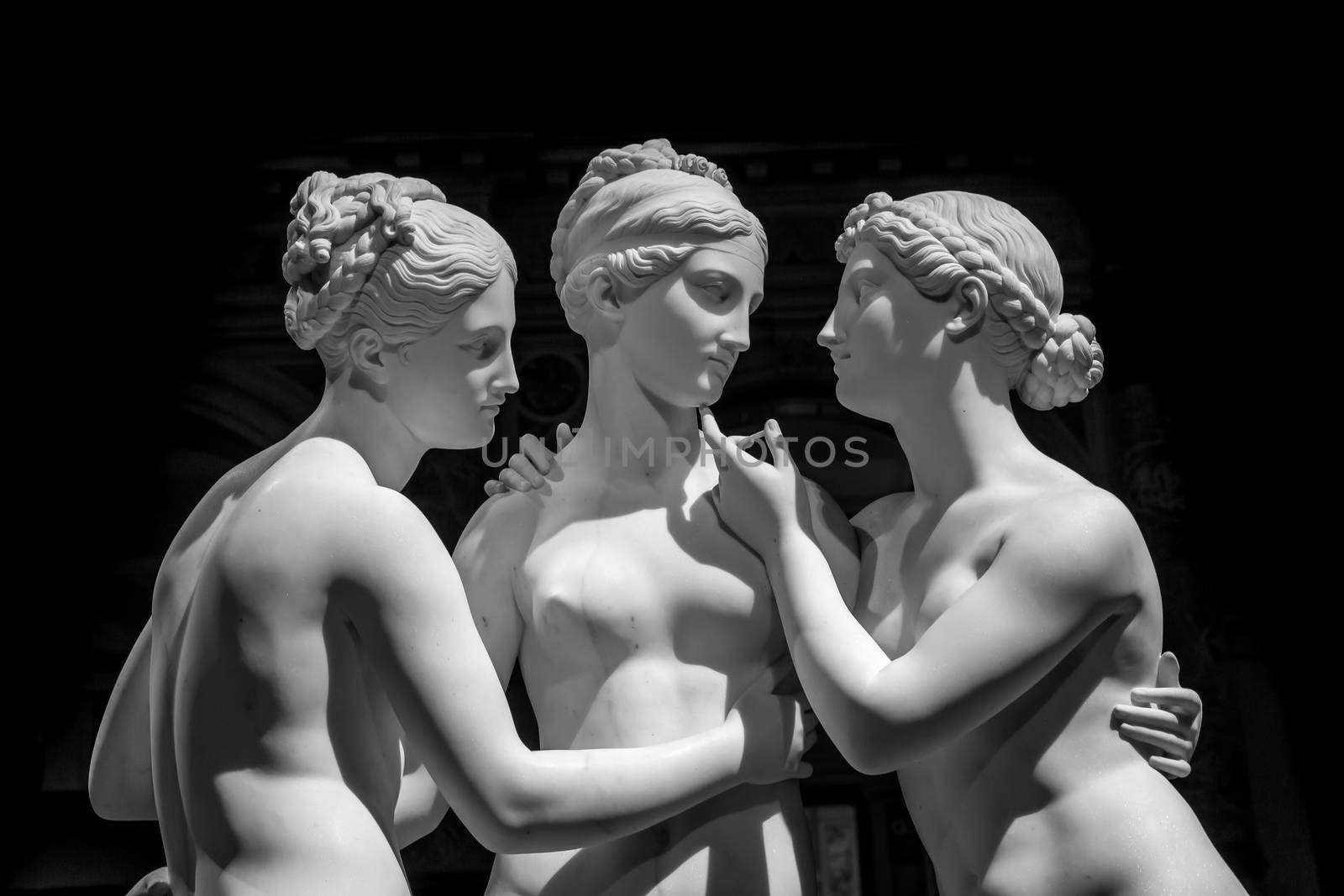 Milan, Italy - June 2020: Bertel Thorvaldsen’s statue The Three Graces. Neoclassical sculpture, in marble, of the mythological three charites.