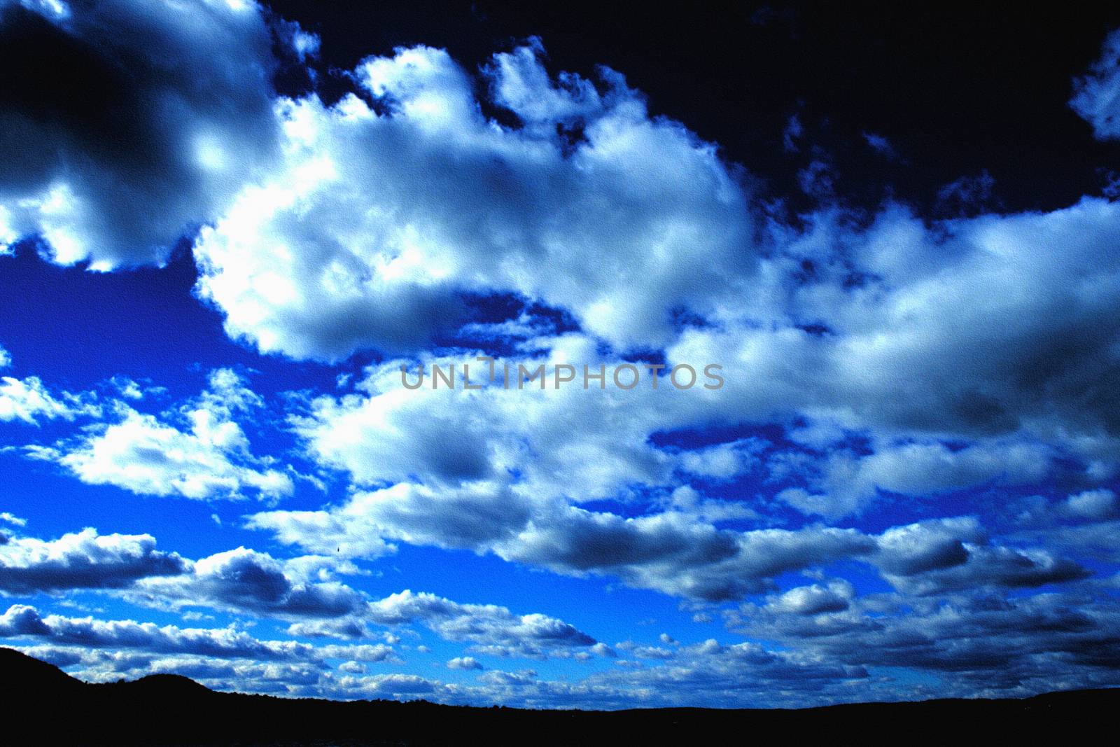 Vivid blue clouds by applesstock