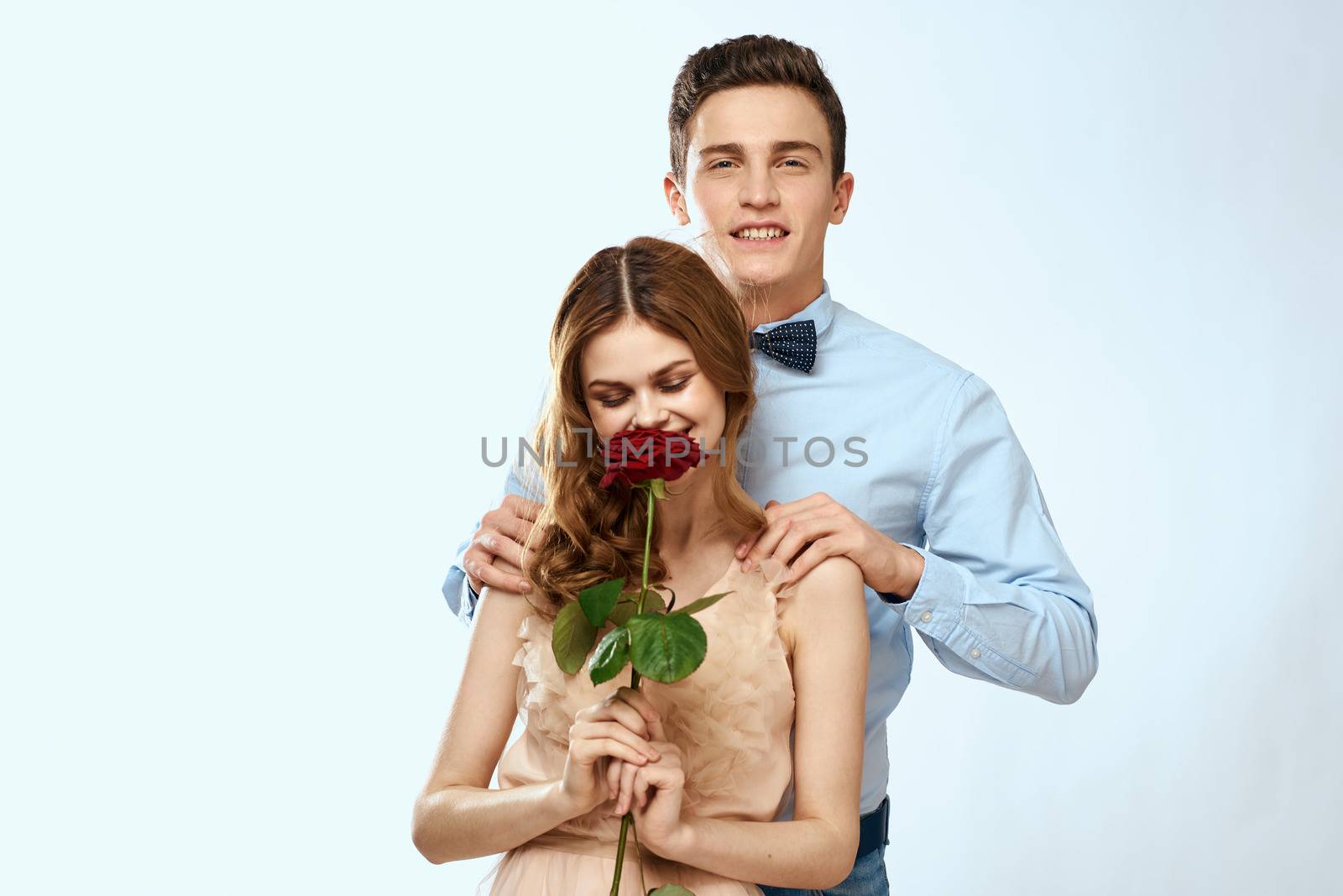 man giving woman roses relationship charm lifestyle embrace lifestyle. High quality photo