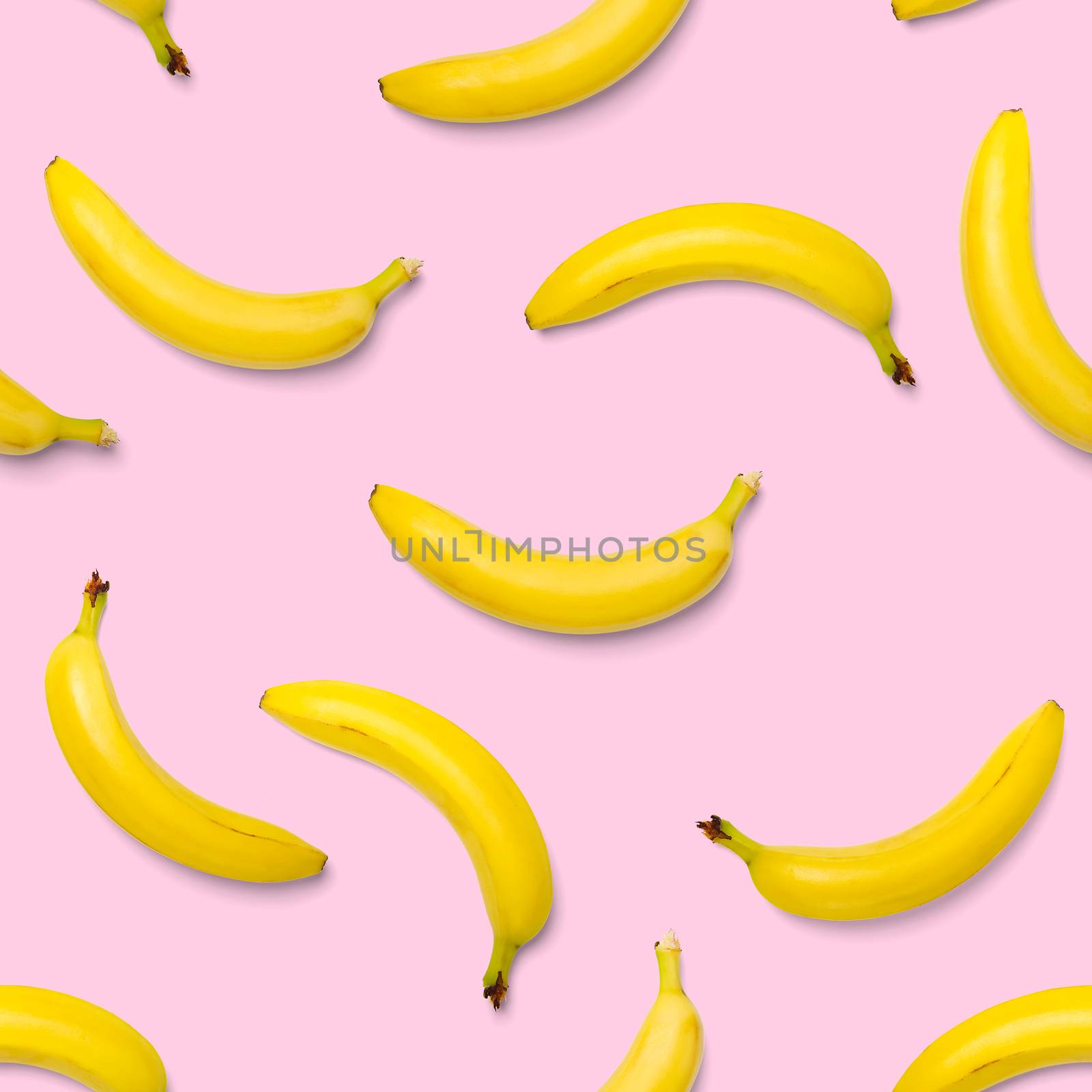 Bananas seamless pattern. pop art bananas pattern. Tropical abstract background with banana. Colorful fruit pattern of yellow banana on pink background, flat lay