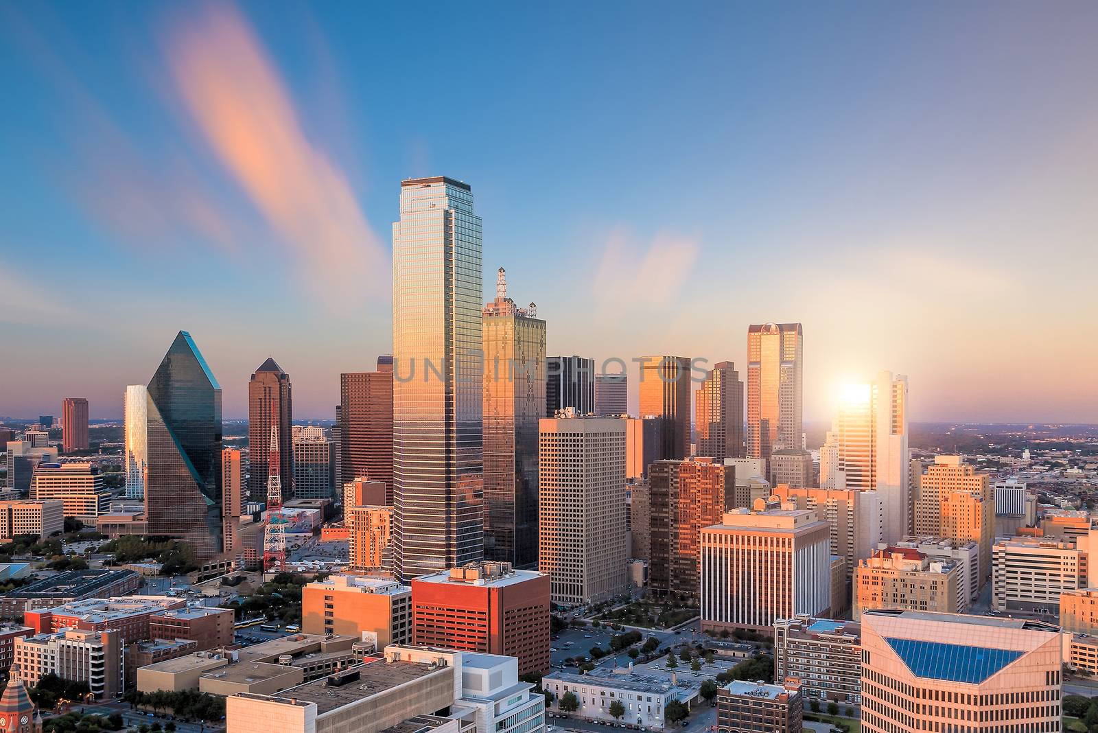 Dallas, Texas cityscape with blue sky at sunset, Texas