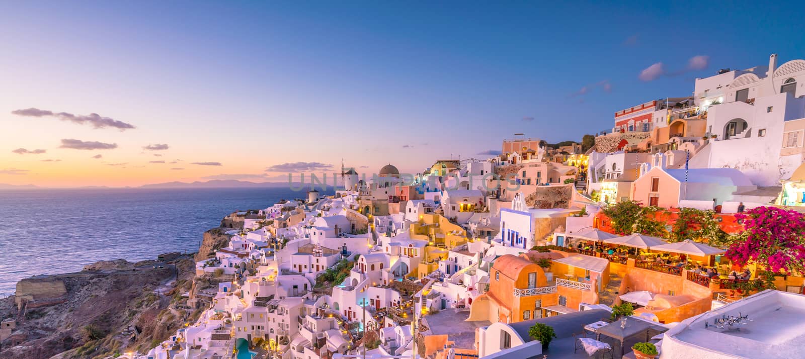 Sunset on the famous Oia city, Greece, Europe by f11photo
