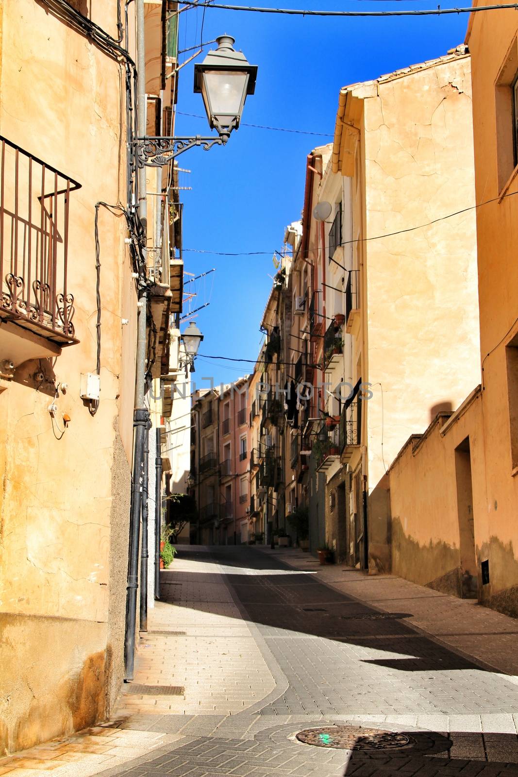 Narrow streets in the village of Jijona in Alicante by soniabonet