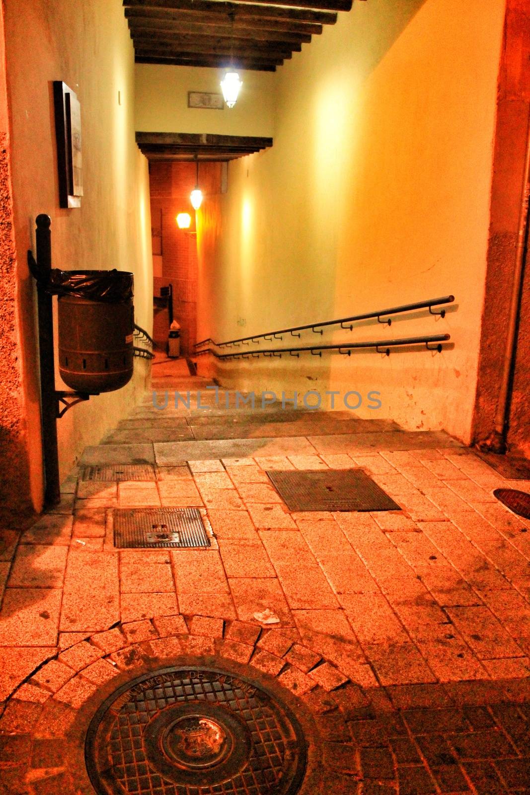 Narrow streets in the village of Jijona in Alicante at night by soniabonet