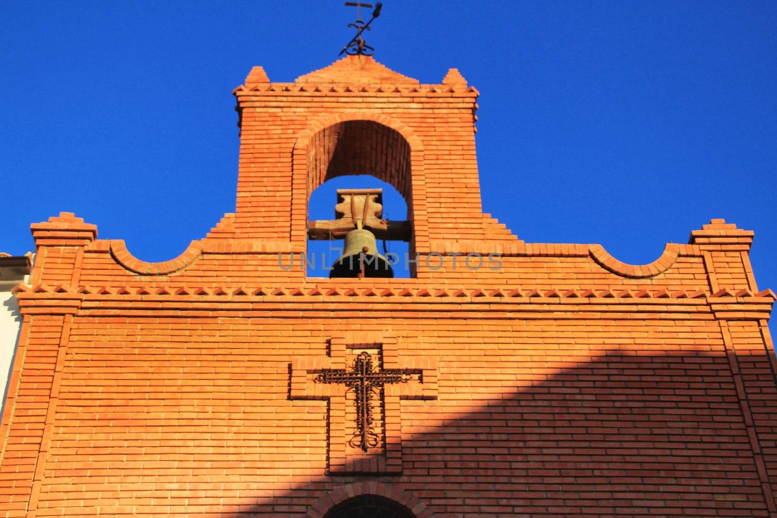 Old bell in antique hermitage in Rute village in Cordoba province, Spain