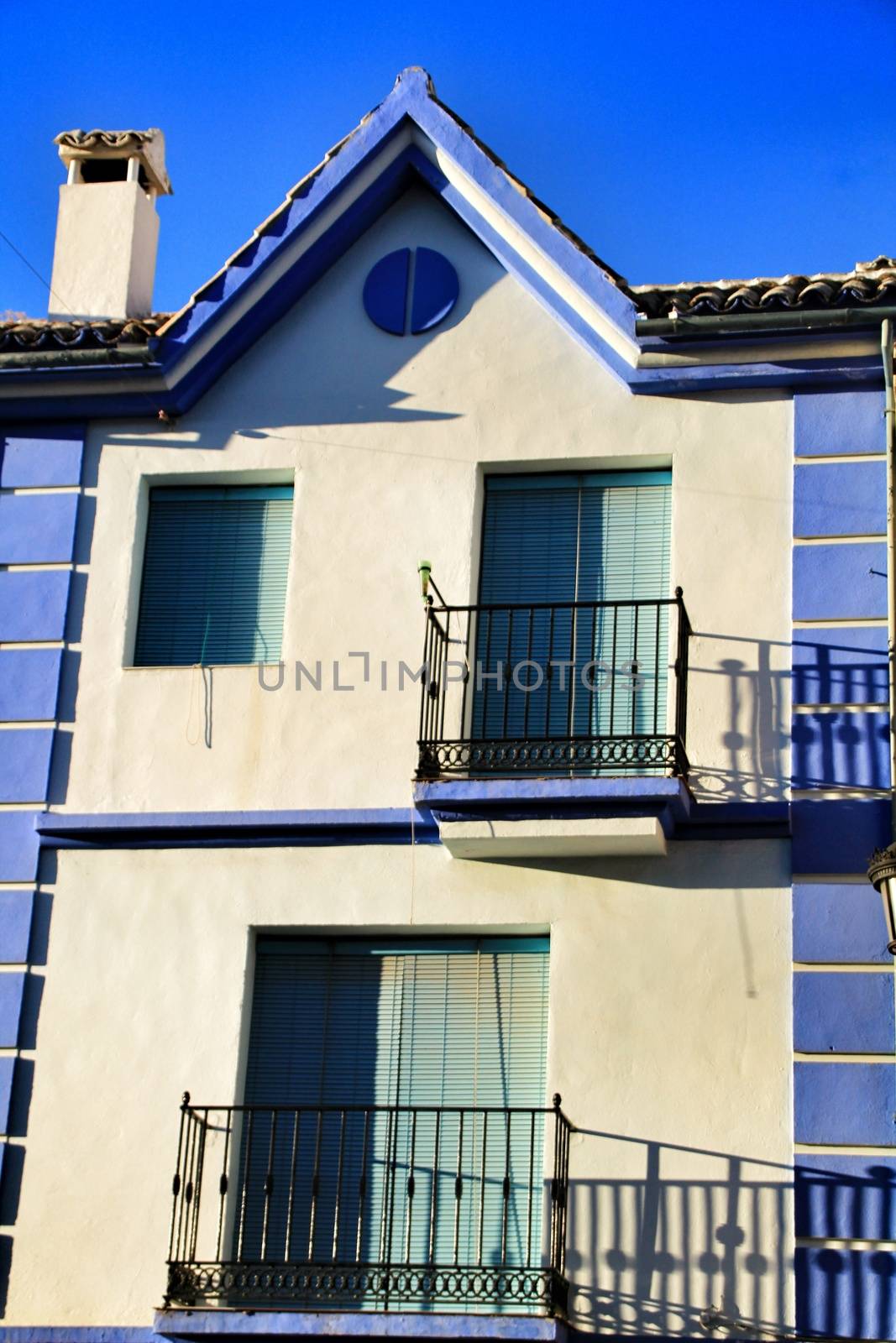 Colorful and majestic old house facade in Rute village, Cordoba province, Spain