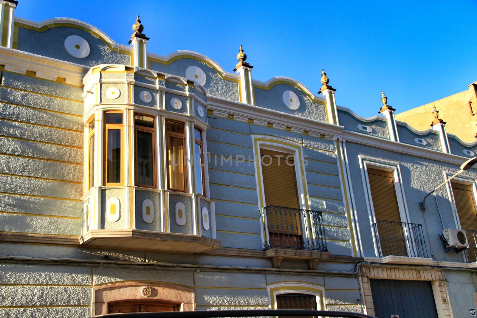 Colorful and majestic old house facade in Rute village, Cordoba province, Spain