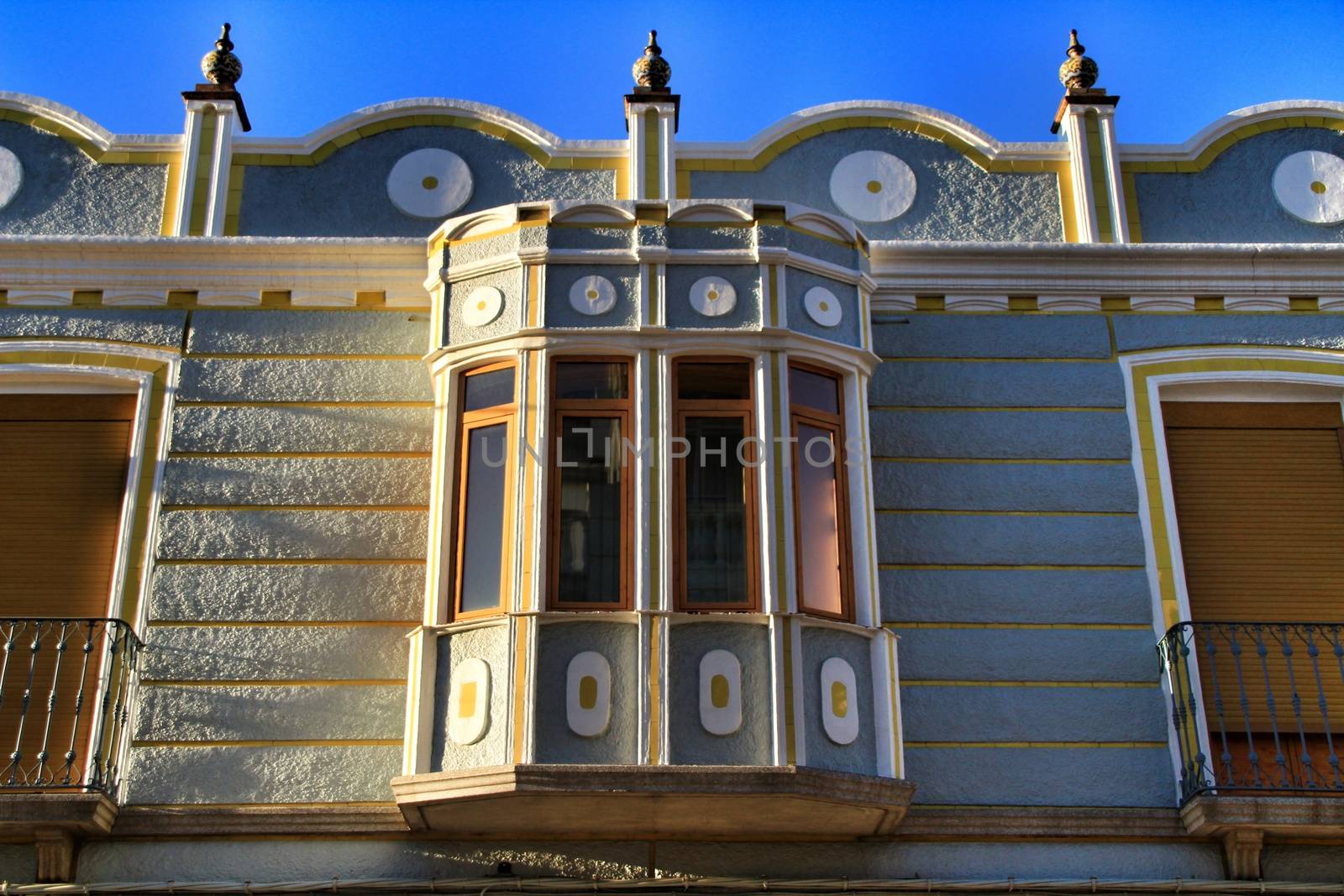 Colorful and majestic old house facade in Rute village, Cordoba province, Spain