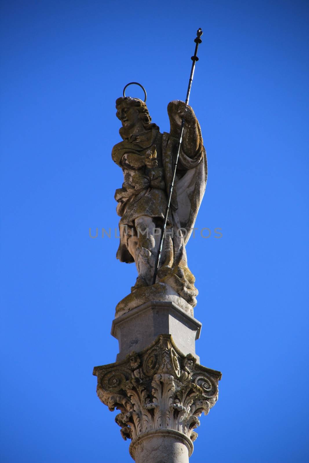Stone angel statue in a square in Cordoba, Spain