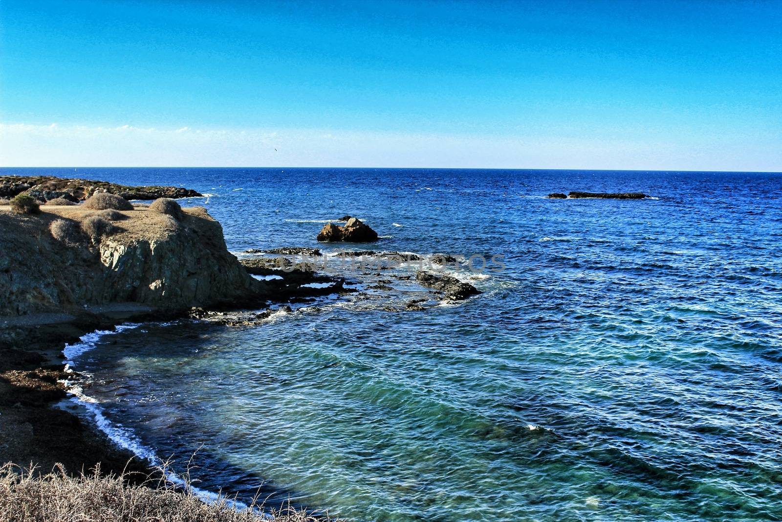 Beaches and cliffs of Tabarca Island in summer in Alicante, Spain