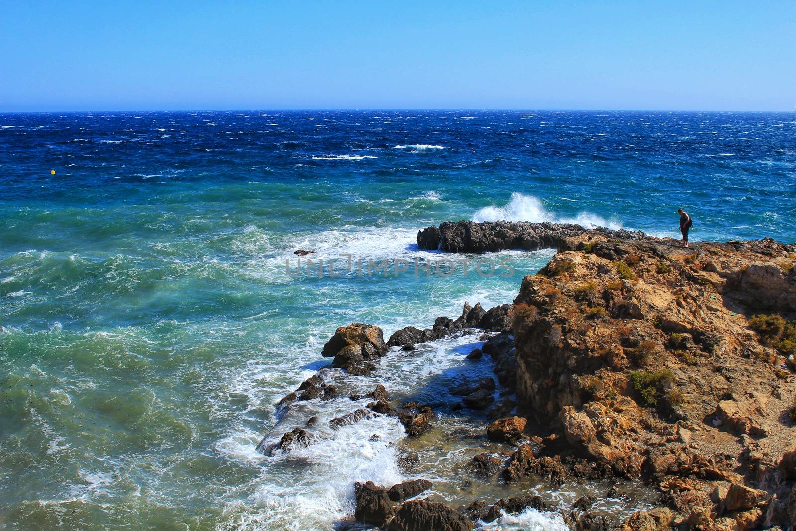 Beaches and cliffs of Tabarca Island in summer in Alicante, Spain