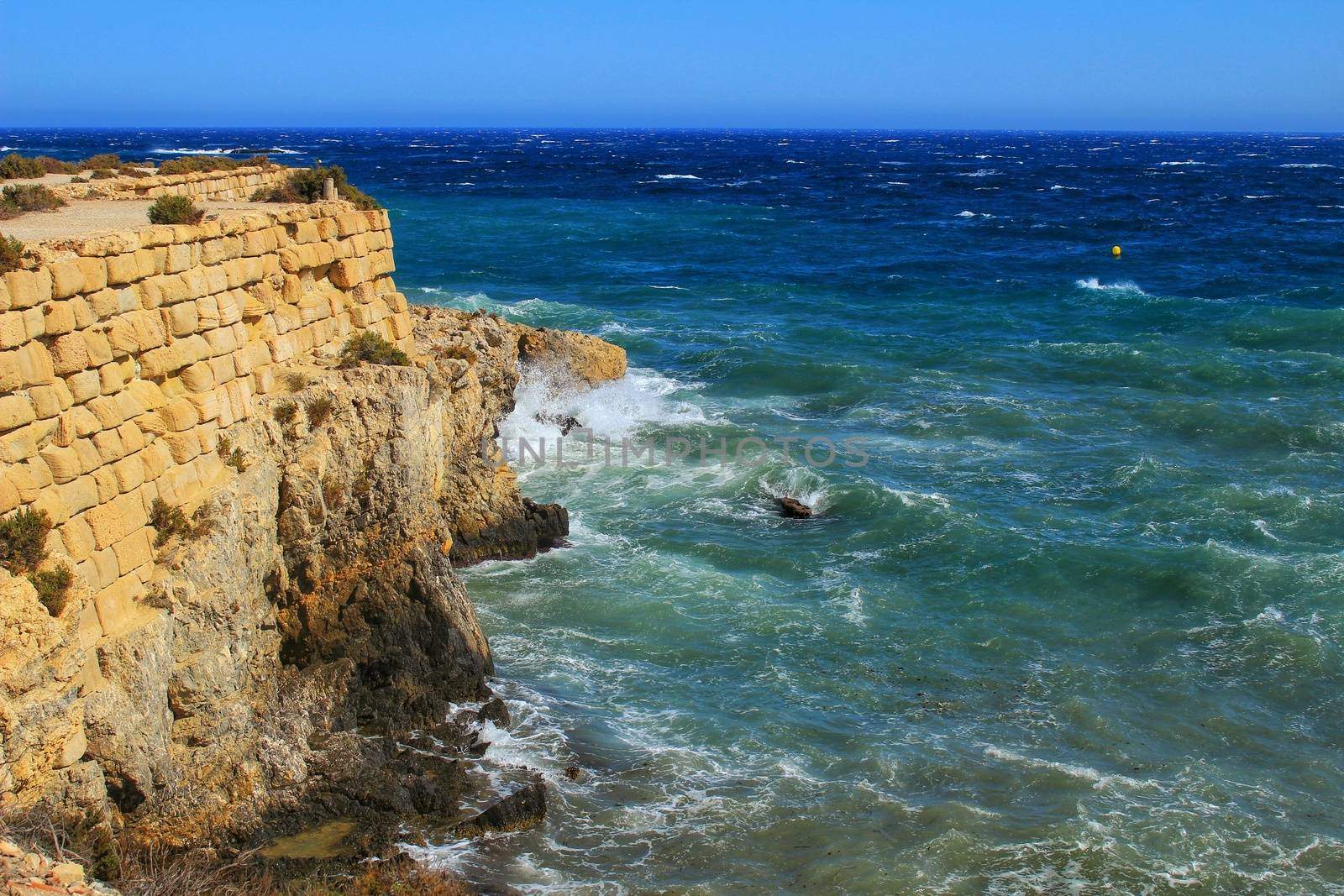 Beaches and cliffs of Tabarca Island in summer in Alicante, Spain