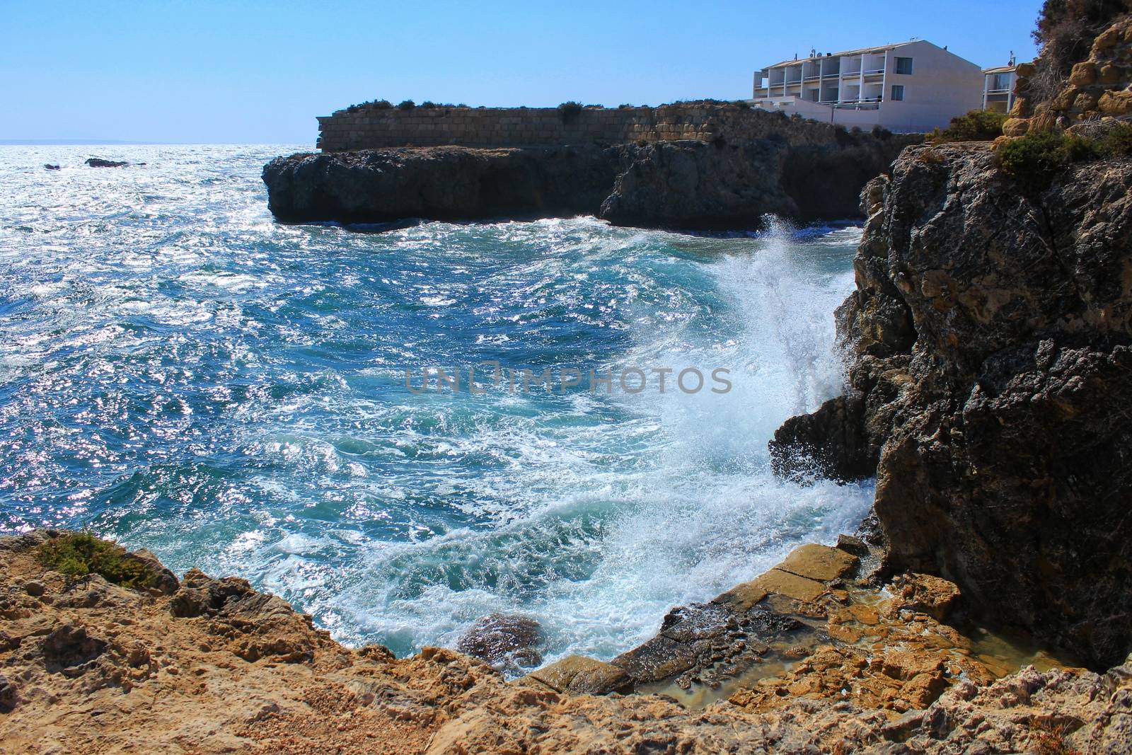 Beaches and cliffs of Tabarca Island in summer in Alicante, Spain