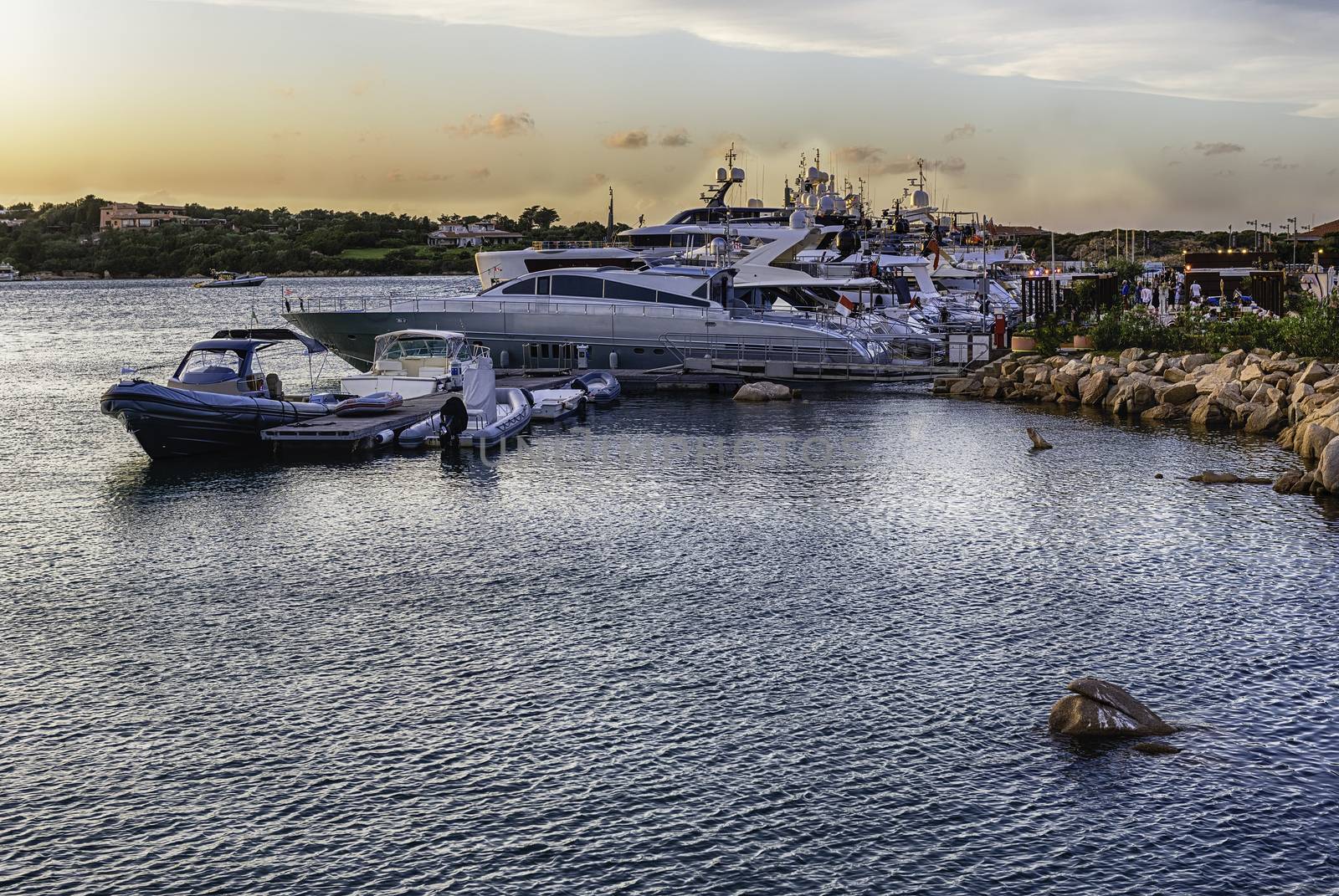 View of the harbor with luxury yachts of Porto Cervo, Sardinia, Italy. The town is a worldwide famous resort and a luxury yacht magnet and billionaires' playground