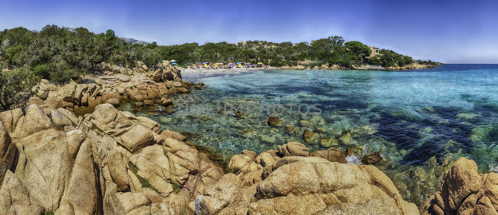 Panoramic view over the enchanting beach of Capriccioli, one of the most beautiful seaside places in Costa Smeralda, northern Sardinia, Italy