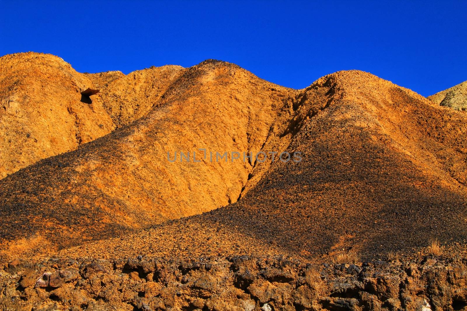 Sediments, rock formations and mineral streaks in an old abandoned quarry in Mazarron, Murcia, Spain