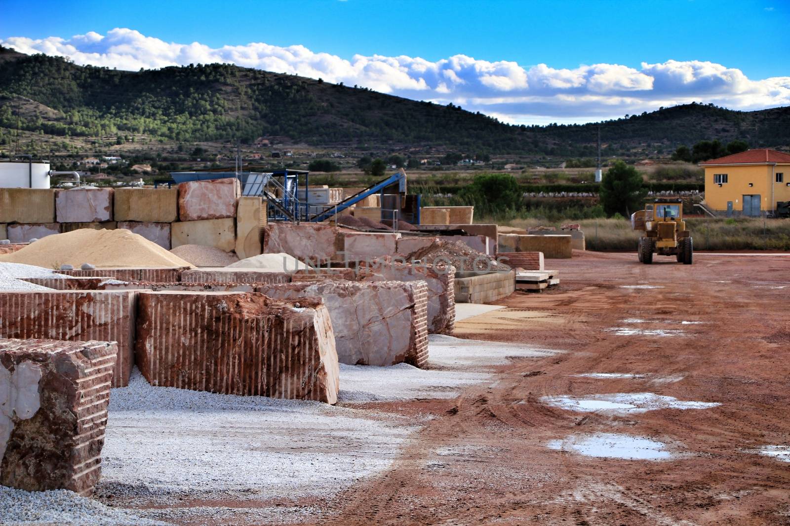 Colorful construction aggregate mountains in Alicante, Spain