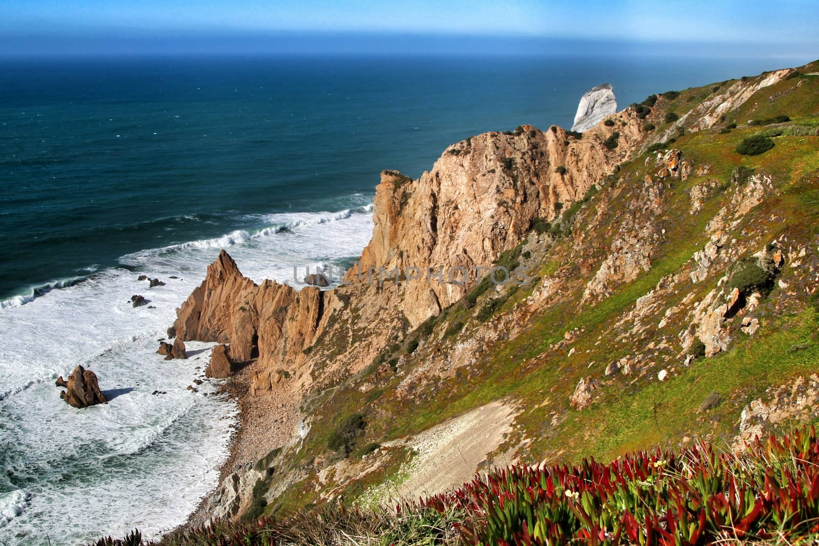Beautiful brave sea and cliffs of the coast of Azenhas do Mar in Portugal in Spring