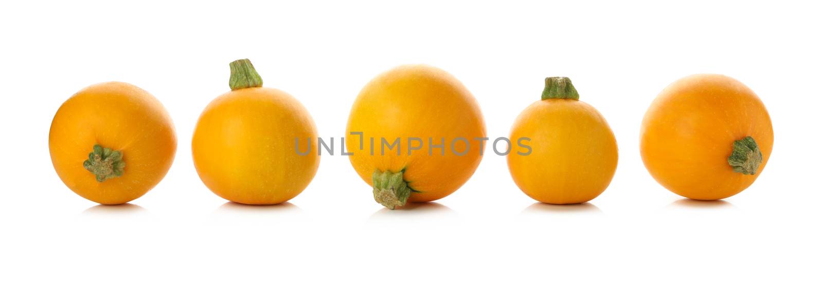 Fresh round zucchini isolated on white background by AtlasCompany