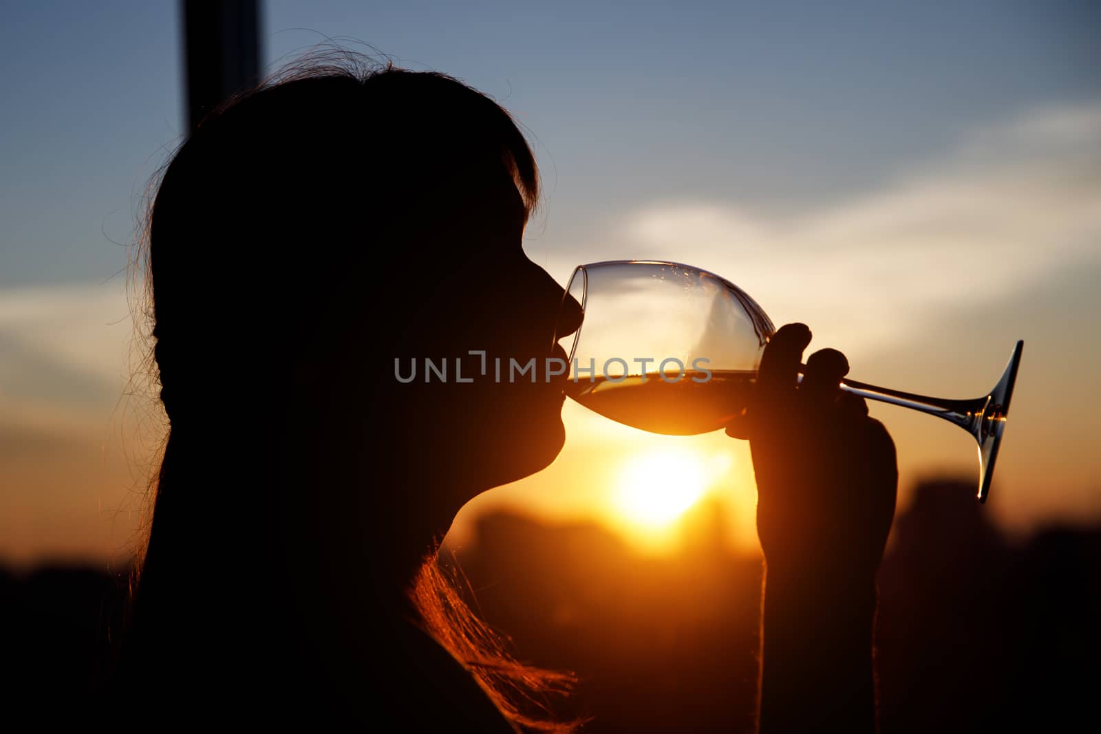 Girl with wine glass. Black silhouette. by 9parusnikov