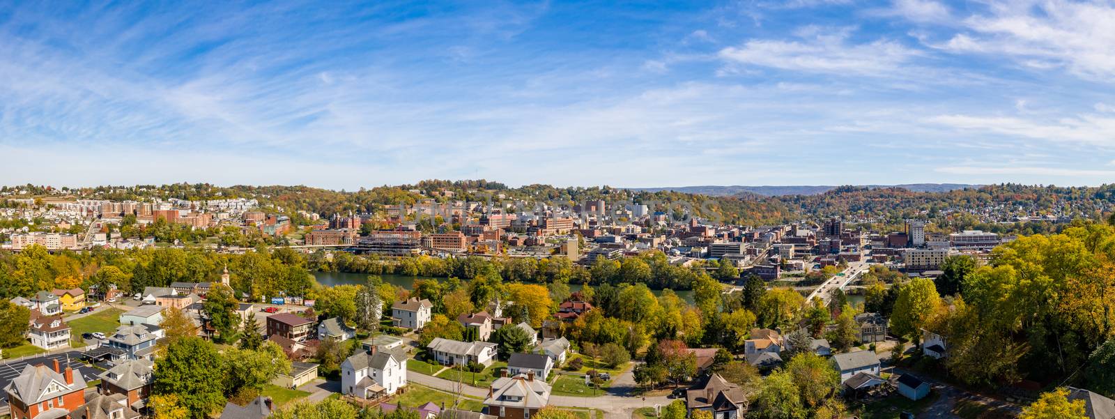 Aerial drone panorama of the downtown area and university in Morgantown, West Virginia by steheap