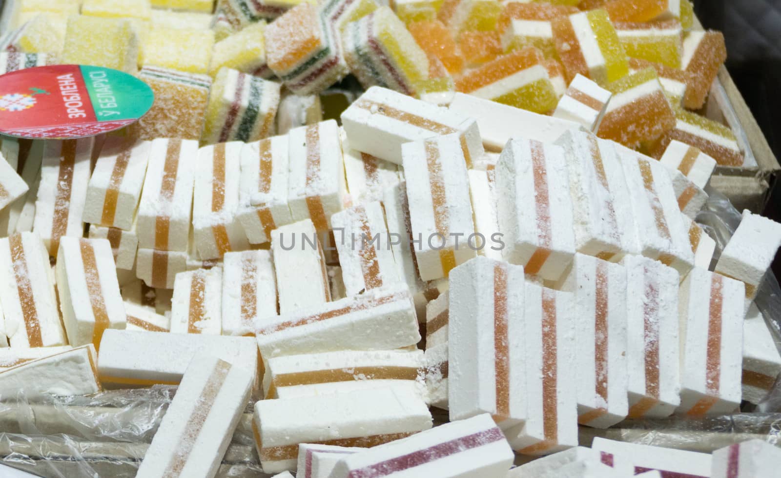 White sweet marshmallow with fruit interlayer on a farmers market counter