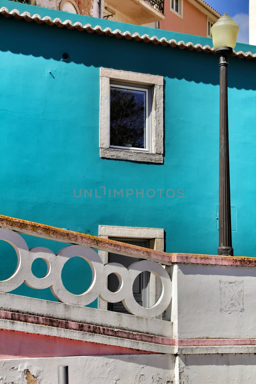 Narrow and colorful streets, majestic facades, windows and balconies of Lisbon, Portugal
